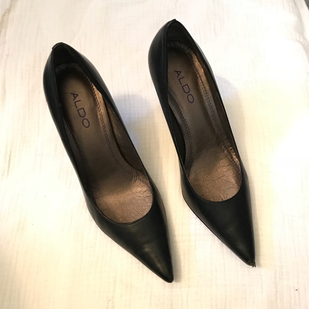 Black leather stiletto pumps